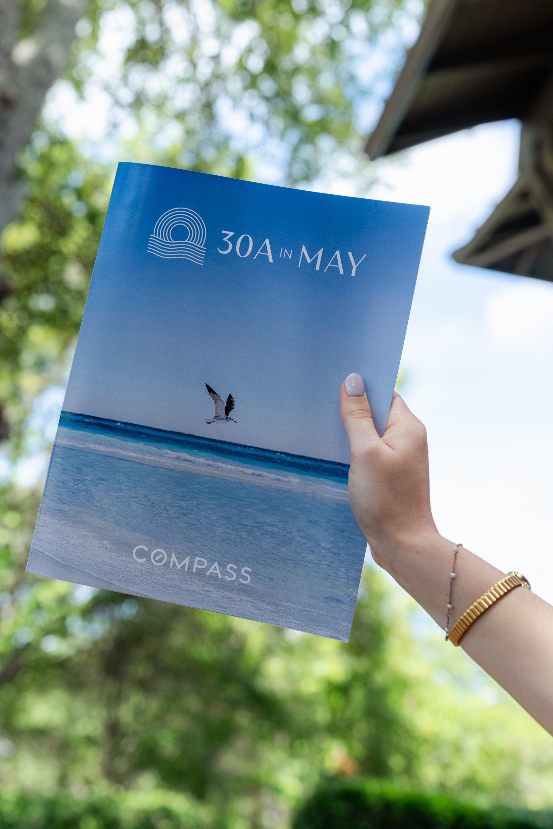 A 30A in May program held up against the sky